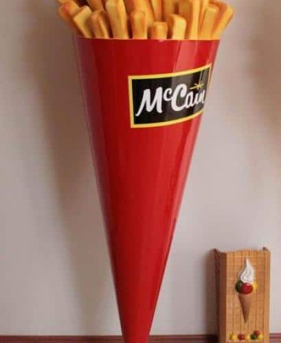 Large red cone-shaped container labeled