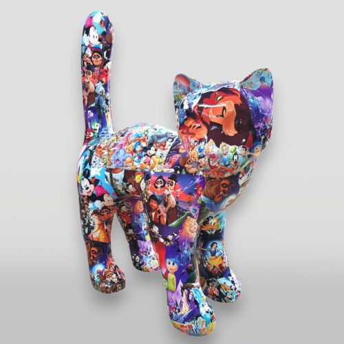 Cat sculpture collaged with Disney characters and scenes.