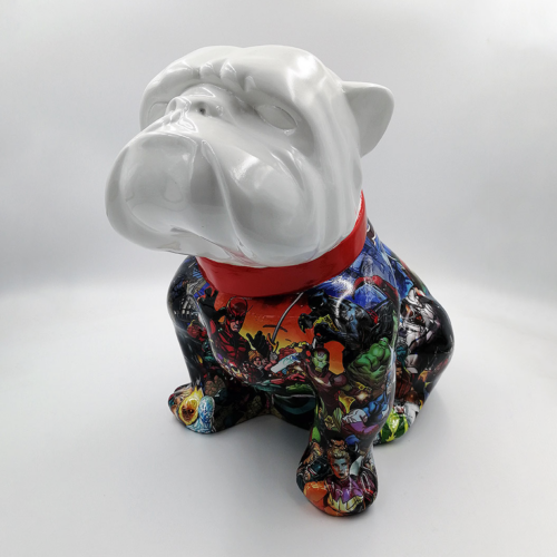 Bulldog statue with a white head, red collar, and body covered in colorful superhero comic book artwork.
