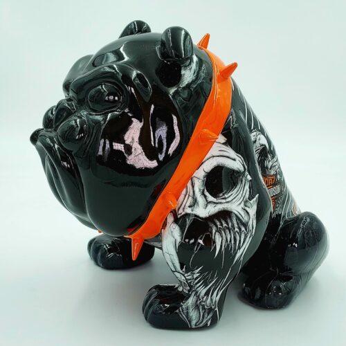 Black bulldog figurine with orange studded collar, featuring painted skull and Harley-Davidson logo.