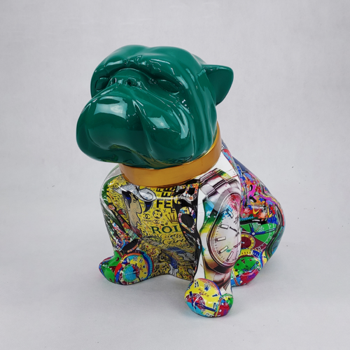 Colorful bulldog statue with a glossy green head and abstract, collage-like designs on its body, featuring various watches and other patterns.
