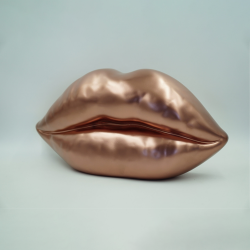 Bronze sculpture resembling a pair of lips.