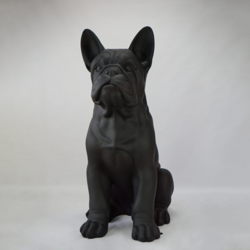 Black French Bulldog sculpture against a white background.