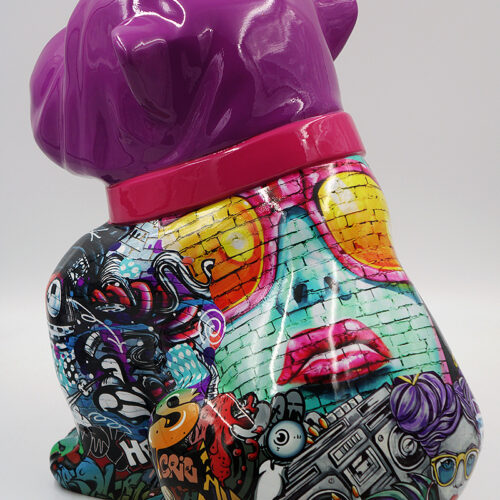Colorful pug sculpture with a glossy purple head and a body covered in vibrant graffiti street art.