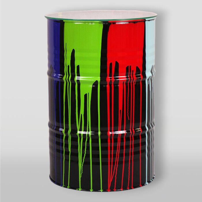 Colorful oil drum with streaks of blue, green, and red paint on a gray background.