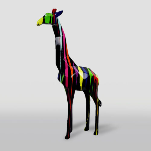 A multi-colored giraffe sculpture with geometric patterns and dripping paint streaks on a plain background.