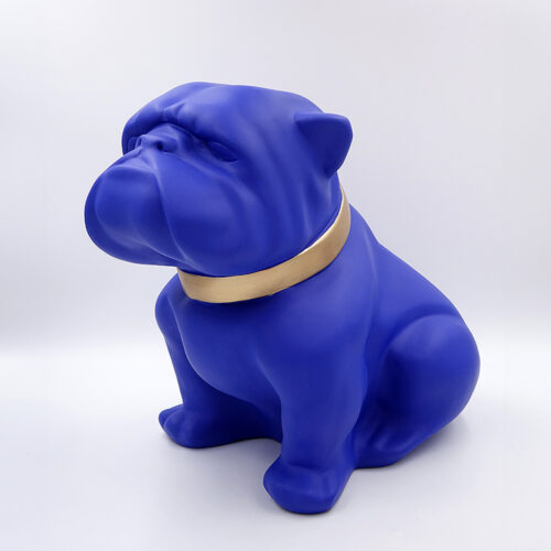 Blue bulldog statue wearing a gold collar.