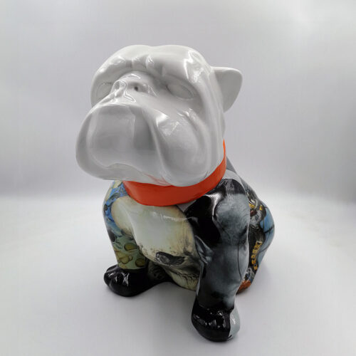 Ceramic bulldog figurine with a white head, an orange collar, and a multicolored body.