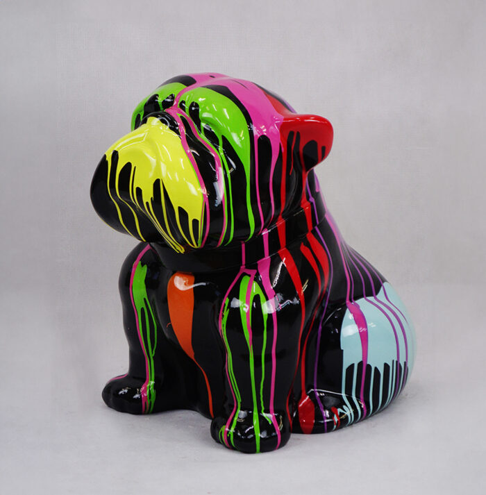 Colorful bulldog sculpture with dripping paint effect in vibrant shades of yellow, green, pink, orange, red, and blue on a black base.