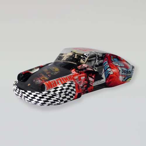 Decorative car bonnet featuring motorsport-themed graphics with a checkered pattern, racing cars, and drivers in red gear.
