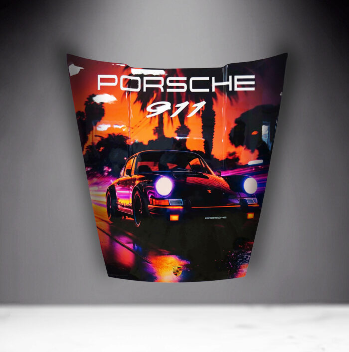 Black Porsche car hood with a painted design showing a Porsche 911 driving against a backdrop of vibrant neon lights and palm trees; the text "PORSCHE 911" is displayed at the top.