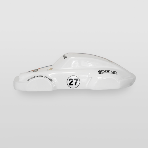 White model racing car with the number 27 and logos for Porsche and Sparco on a gray background.