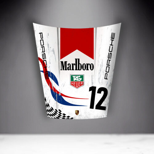 Hood of a race car featuring Marlboro, TAG Heuer, and Porsche branding with the number 12.