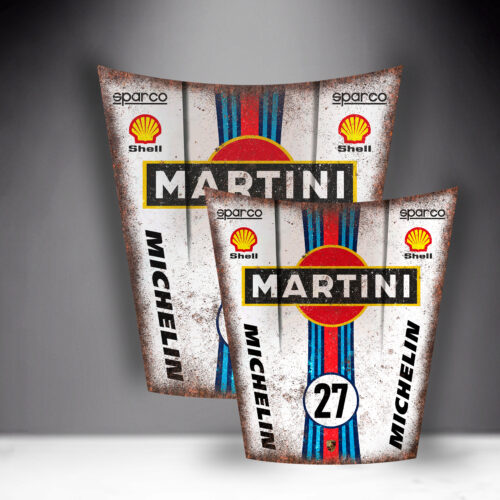 Rusty racing car hoods with Martini, Shell, Sparco, and Michelin logos.
