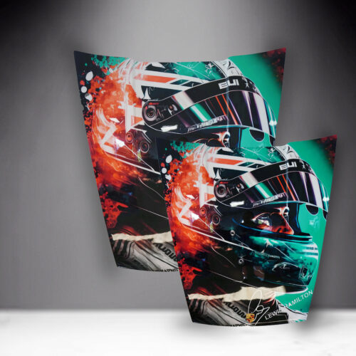 Colorful posters of a race car driver wearing a helmet.