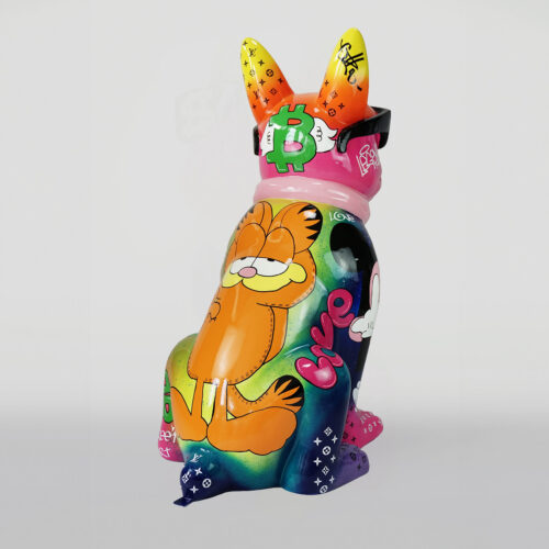 Colorful sculpture of a dog with cartoon-style graffiti, featuring Garfield, a Bitcoin symbol, and various vibrant designs.