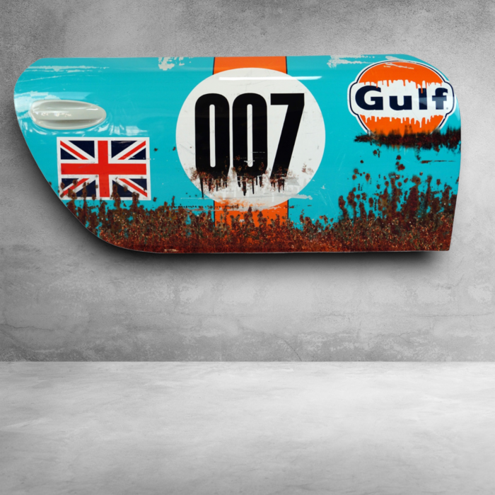 Rusty car door with Gulf logo, number 007, and a British flag.