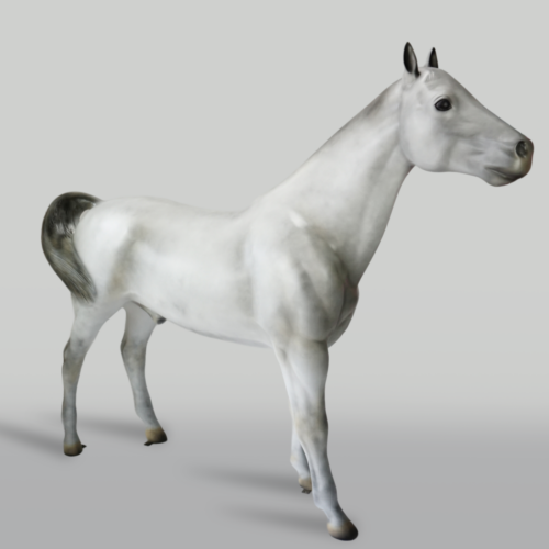 A realistic, white horse statue with black and white tail and black hooves standing on a plain background.