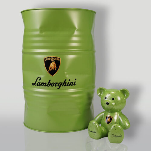 Green Lamborghini barrel with Lamborghini logo and branding beside a matching green bear figurine with the same logo and branding against a plain white background.