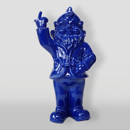 A shiny blue porcelain garden gnome with a beard, standing and pointing upward with one hand.