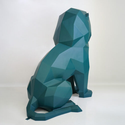 Geometric teal lion sculpture with faceted surfaces, viewed from the side on a white background.