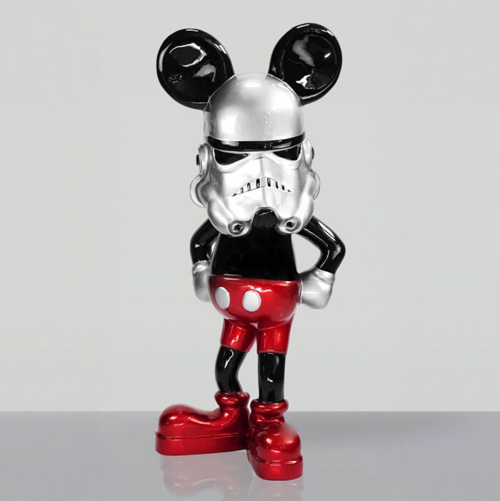 Sculpture combining elements of a Stormtrooper helmet and Mickey Mouse body and clothing.