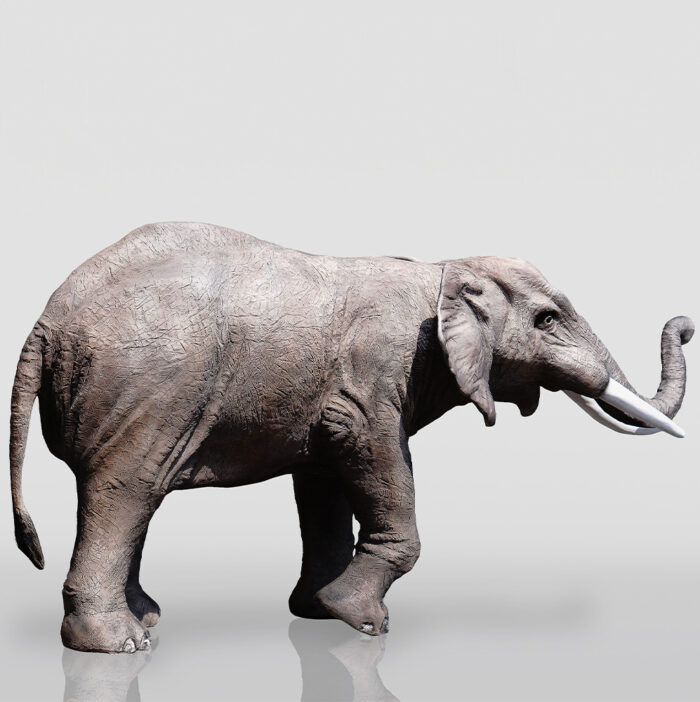 Side view of a woolly mammoth statue.