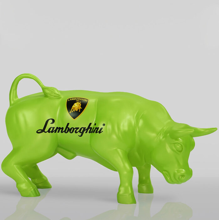 A green bull figurine with the Lamborghini logo and text on its side.