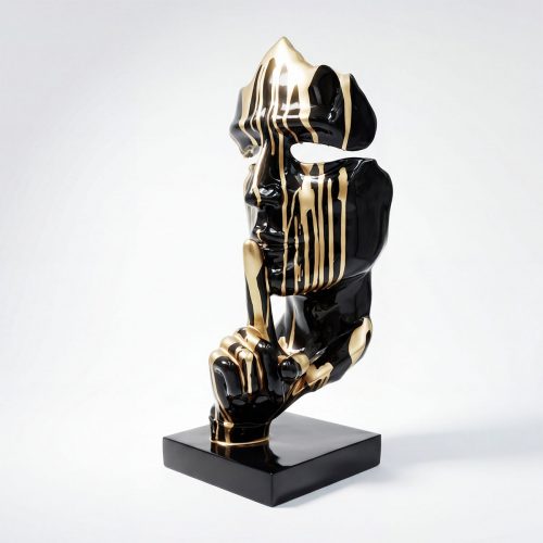 sculpture face figure in glossy black fiberglass with gold drip accents showing a finger-to-lips shushing pose for decor/advertising