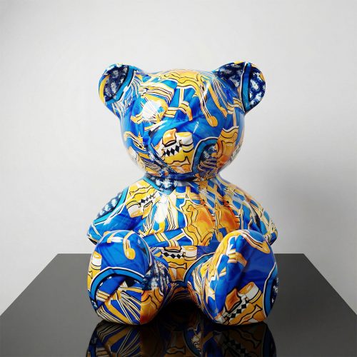 figure teddy bear sculpture in glossy fiberglass with blue and gold abstract pattern, decorative display for retail or events
