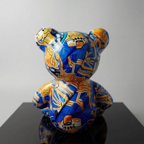 sculpture bear figure in glossy fiberglass with blue and gold abstract pattern, decorative display for retail or events
