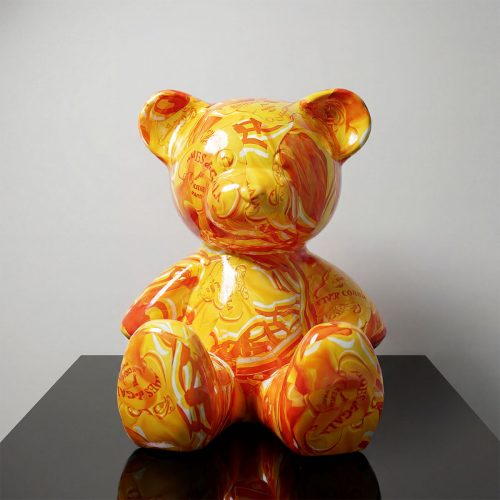 figure teddy bear sculpture in glossy orange and yellow laminate with swirled pattern, for advertising or mall decoration