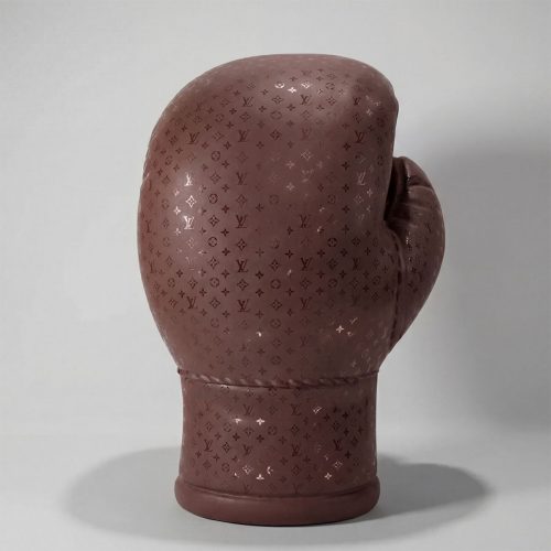 figure boxing glove sculpture in brown fiberglass with designer monogram pattern, luxe decorative or advertising display