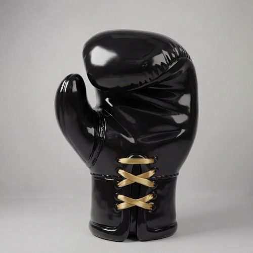 sculpture boxing glove figure in glossy black fiberglass with gold lace-up detail, modern decorative or advertising display