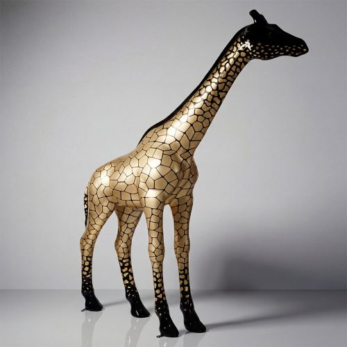 figure giraffe sculpture in glossy gold and black fiberglass with geometric spot pattern, decorative for mall or event
