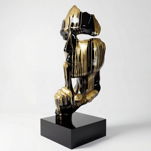 sculpture face figure in glossy black fiberglass with gold drip accents, abstract modern style for gallery or lobby display