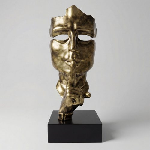 sculpture mask figure in antique gold fiberglass showing a finger to lips, modern artistic decor for interiors or events