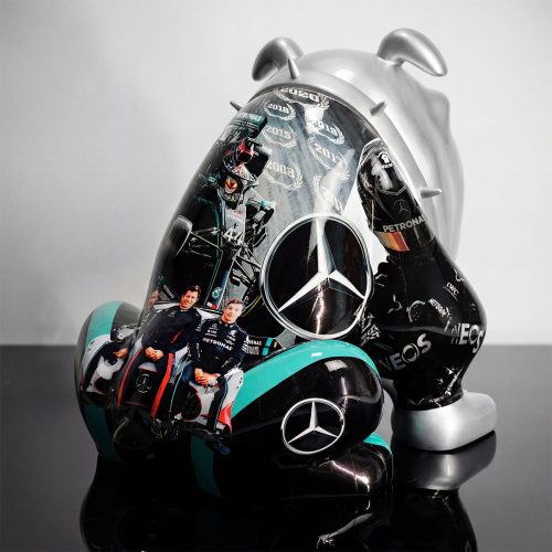 sculpture dog figure in silver and black fiberglass with Mercedes racing graphics and teal accents for advertising or decor