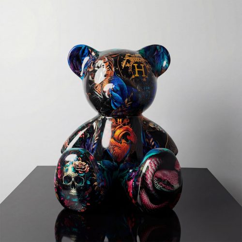 sculpture teddy bear in glossy fiberglass with dark floral, skull and snake motifs, colorful artistic decor for mall or event