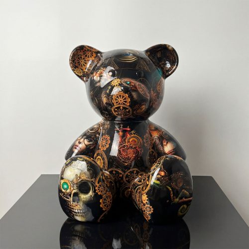 figure teddy bear sculpture in glossy black fiberglass with gold steampunk gears and skull motifs for decor or advertising
