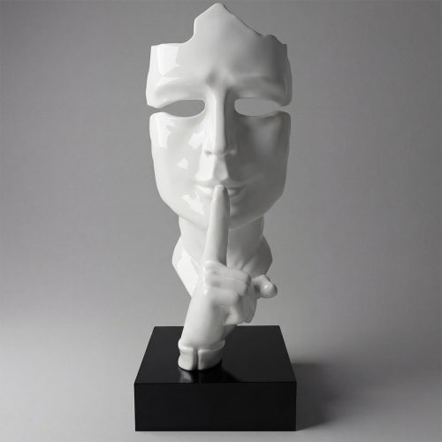 figure of a glossy white fiberglass face with finger to lips in minimalist artistic style for decor or advertising