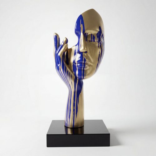 sculpture face and hand figure in fiberglass with metallic gold base and blue drip stripes, modern decorative piece for interiors