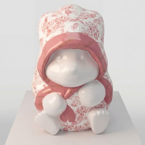 figure rabbit sculpture in glossy white fiberglass with pink Dior-patterned laminate hood, decorative branding piece for shops or events