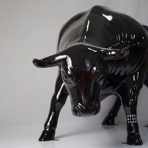figure bull sculpture in glossy black fiberglass with modern stylized form for advertising or mall decoration