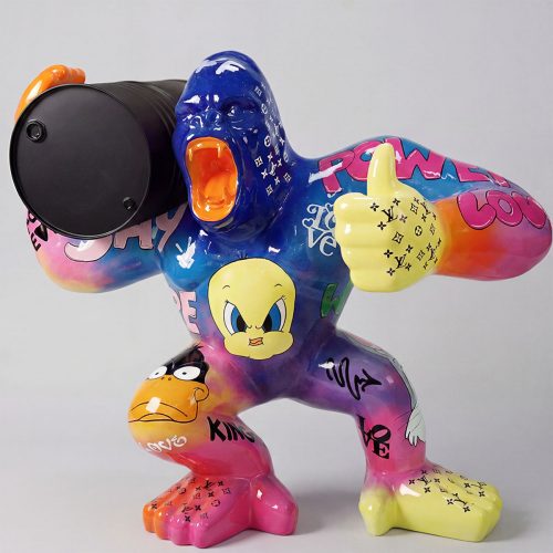 sculpture gorilla figure in colorful graffiti style fiberglass with orange mouth, yellow thumbs-up and cartoon decals for advertising or decor