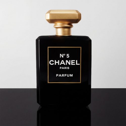 figure perfume bottle in black fiberglass with gold geometric cap, minimalist luxury style for retail displays