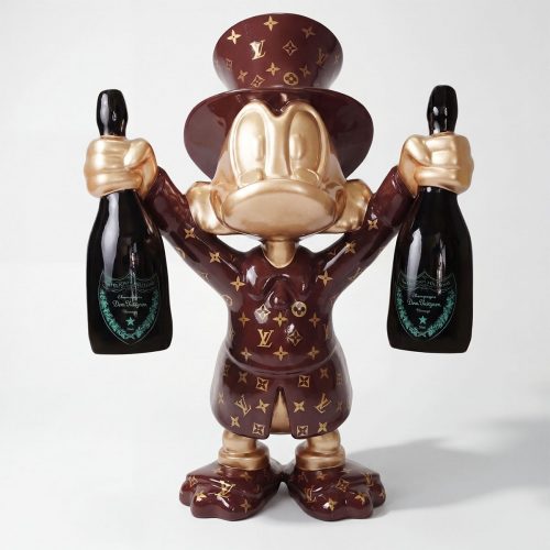 figure Donald Duck sculpture in brown Louis Vuitton print fiberglass with gold accents holding two champagne bottles, decor/advertising