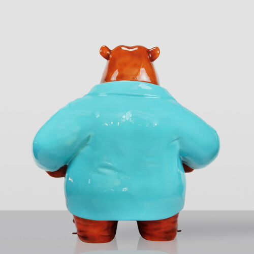 Back view of a ceramic bear figurine wearing a glossy light blue jacket against a plain light gray background