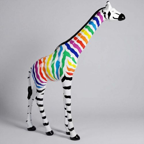 figure giraffe fiberglass sculpture with rainbow zebra-style stripes, glossy white and black legs, for retail or event display