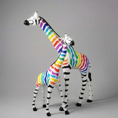 sculpture giraffe pair in fiberglass with rainbow zebra-style stripes, artistic colorful display for advertising or mall decor